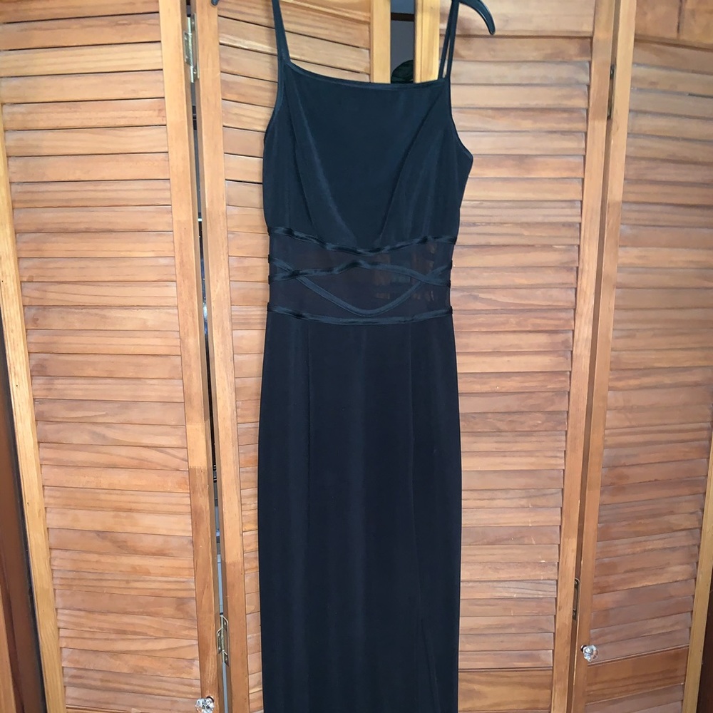 Long evening dress with slit skirt.